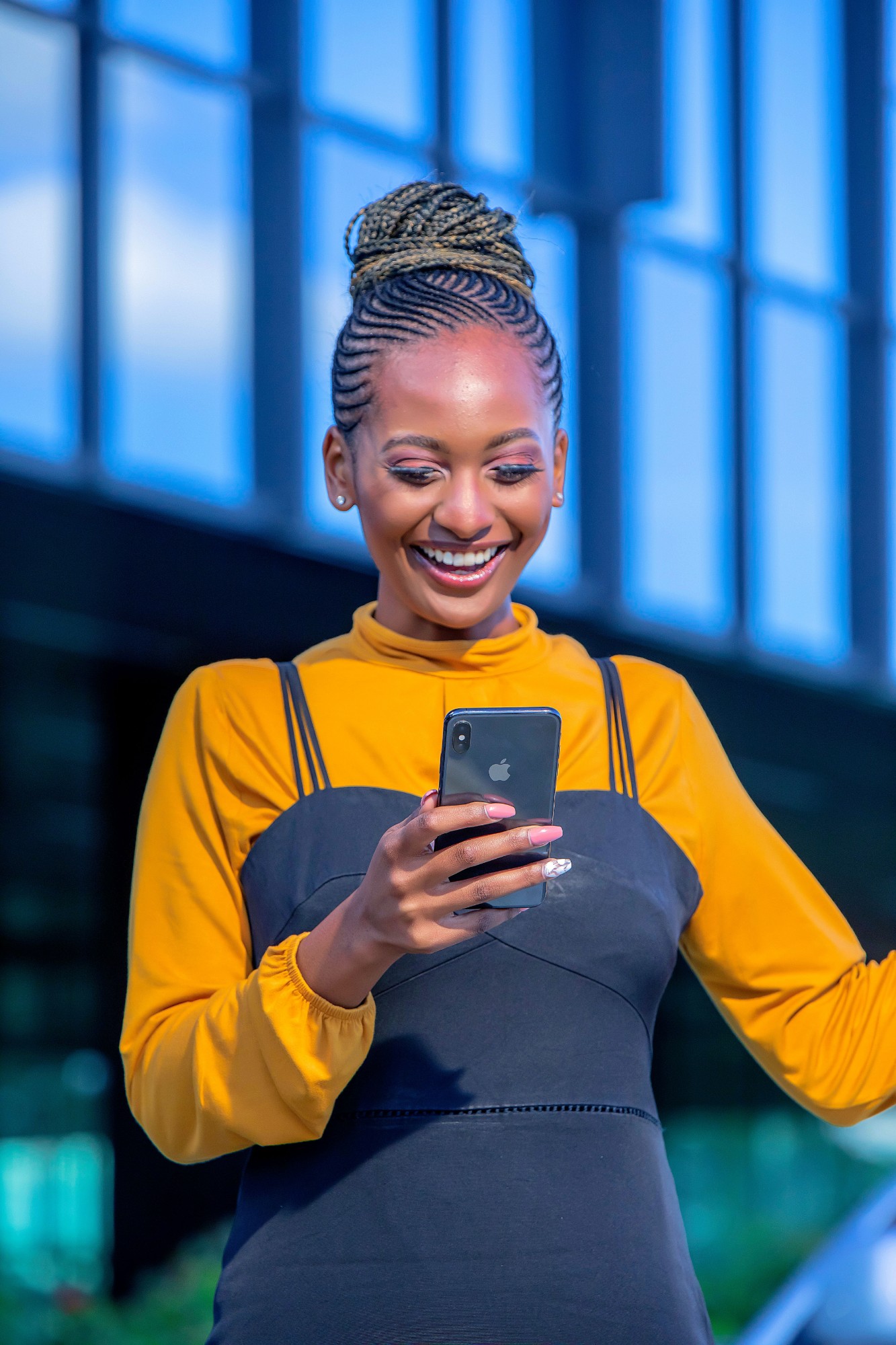 A customer reviewing a loan on her phone